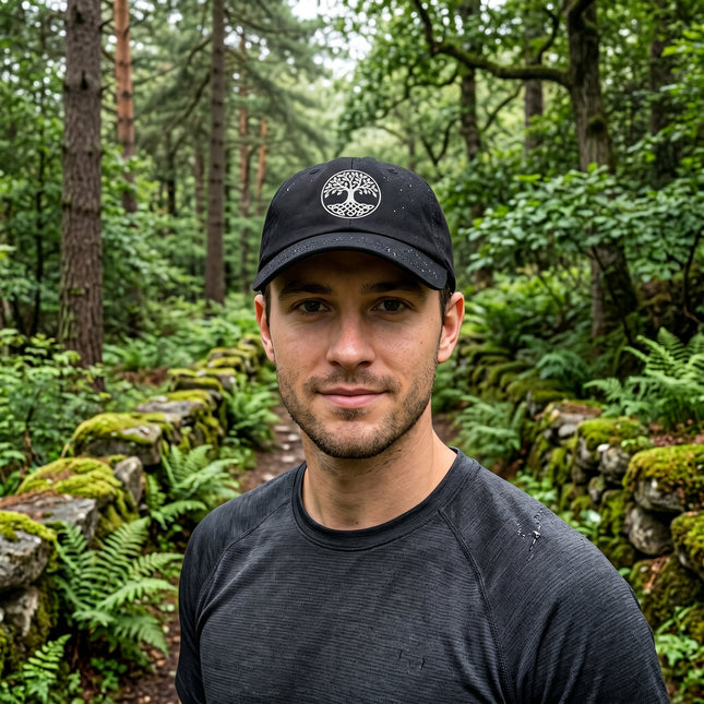 Black baseball cap featuring embroidered Celtic Tree of Life design.
