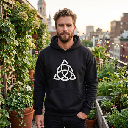 Black hoodie featuring a white Triquetra Celtic knot symbol design. Unisex graphic pullover.
