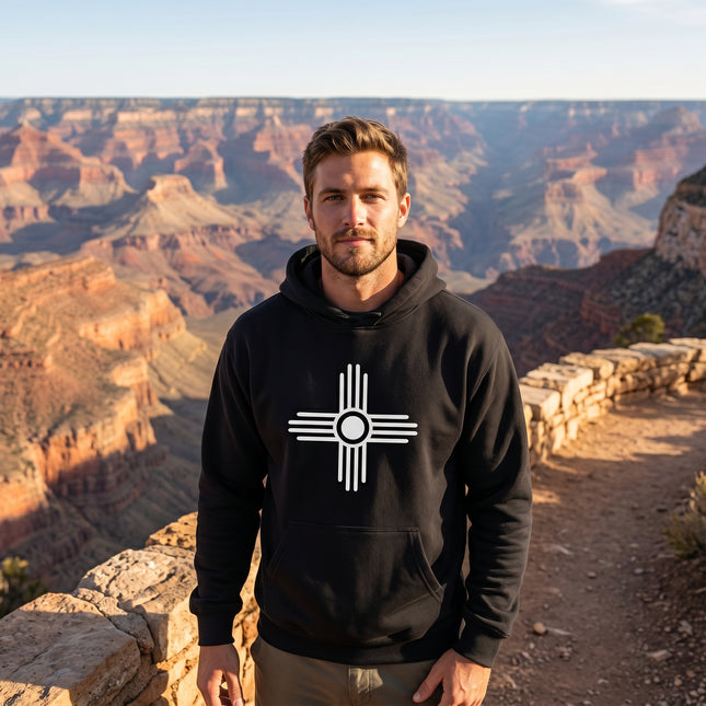 Black hoodie featuring the white Zia Sun Symbol graphic. Unisex pullover fleece for spiritual style.