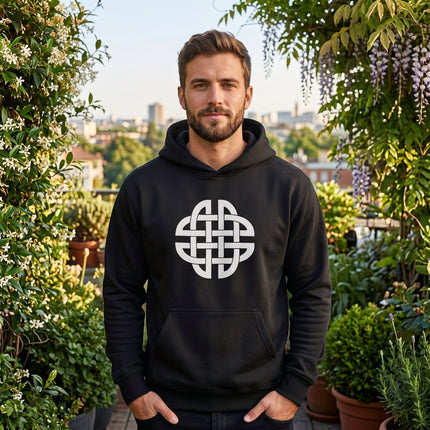 Black hoodie featuring a white Celtic knot symbol. Unisex Irish design apparel.