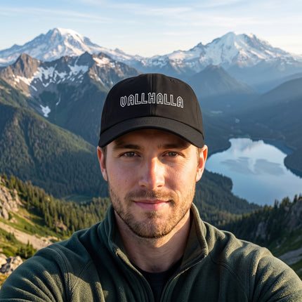 Black embroidered baseball cap featuring "VALLHALLA" text, perfect for Norse mythology streetwear.