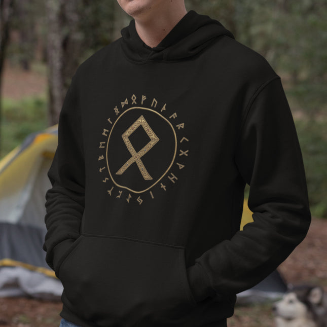Black hoodie featuring the Othala rune and Futhark circle in gold Norse mythology design.