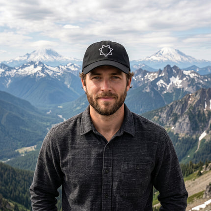 Black baseball cap with embroidered Star of Babalon occult symbol.