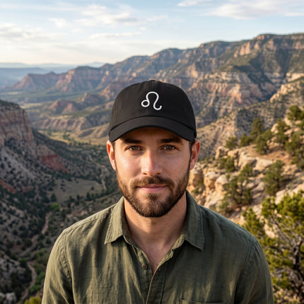 Black dad hat with embroidered Leo zodiac symbol. Astrology sign cap for men.