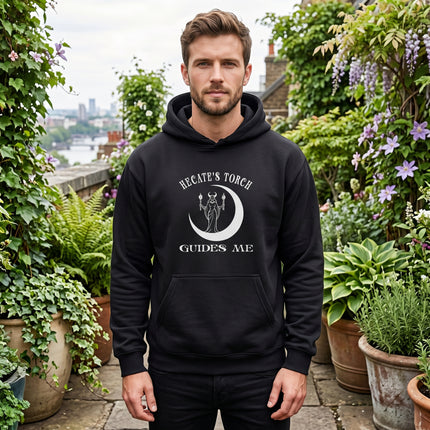 Hecate's Torch Guides Me graphic on a black pullover hoodie featuring a goddess and crescent moon.