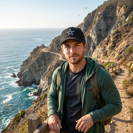 Black baseball cap featuring a white embroidered pentagram symbol.