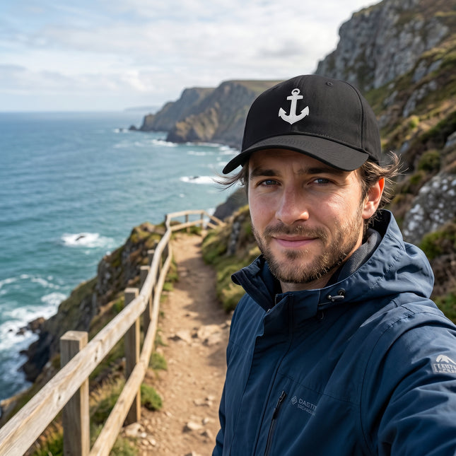 Black embroidered anchor baseball cap with nautical marine symbol.