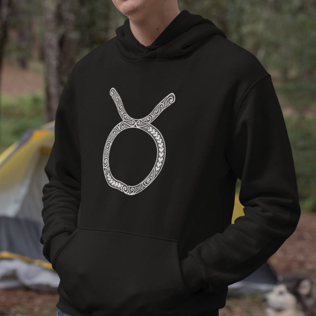 Ornate Taurus zodiac symbol graphic on a black pullover hoodie.