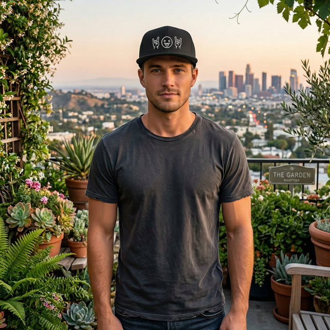 Black snapback hat featuring embroidered rock emoji and pop culture designs.