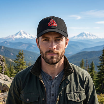 Black dad hat with red embroidered Odin's horns rune circle design.