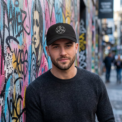 Black baseball cap featuring embroidered Merkaba sacred geometry design.