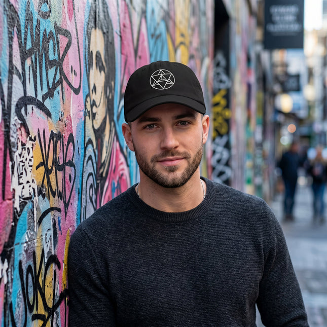 Black baseball cap featuring embroidered Merkaba sacred geometry design.