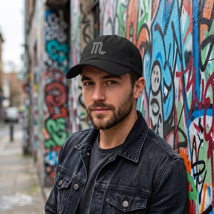 Black embroidered zodiac baseball cap with minimalist celestial embroidery for men.