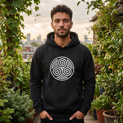 Celtic Triskele symbol on black hoodie. Triple spiral knotwork design for spiritual wear.