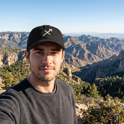 Black embroidered Sagittarius zodiac sign cap featuring the celestial arrow symbol.