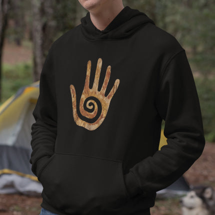Hopi Hand symbol with spiral design on a black hoodie. Boho protection and healing art.