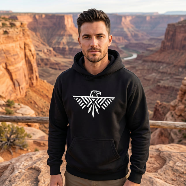 Black pullover hoodie featuring a white geometric thunderbird eagle graphic design.