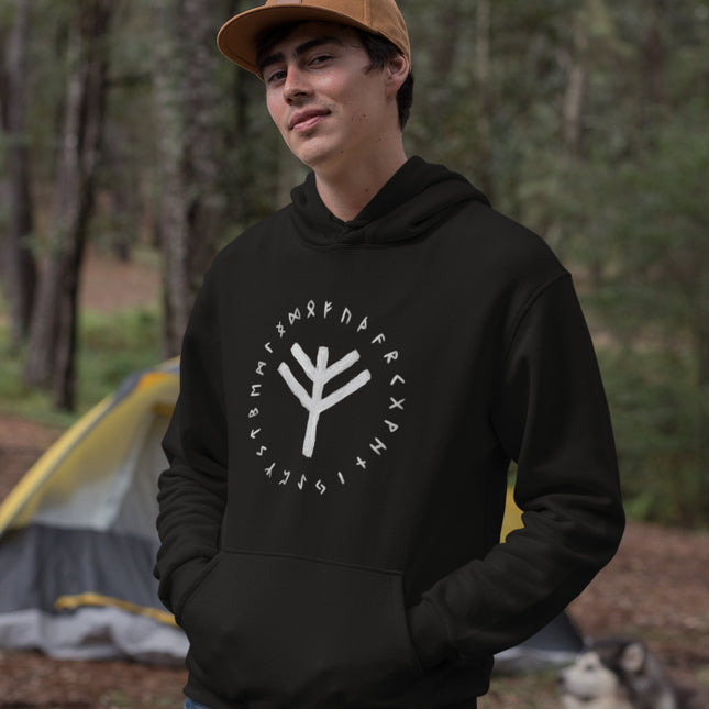 Norse Fehu rune and Elder Futhark alphabet graphic on a black pullover hoodie.
