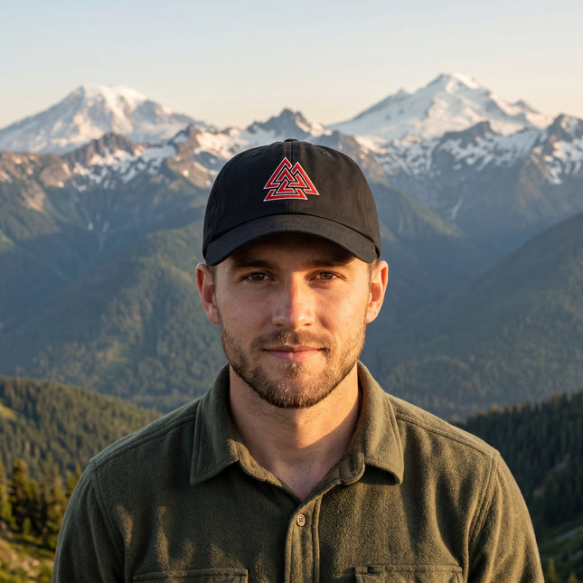 Black baseball cap featuring red embroidered Norse Valknut symbol.