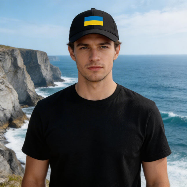 Black baseball cap featuring the Ukrainian flag. Blue and yellow design for support and national pride.