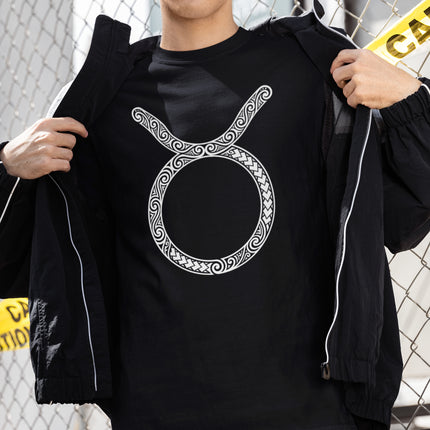 Black tee with ornate Celtic knot Taurus zodiac symbol design.