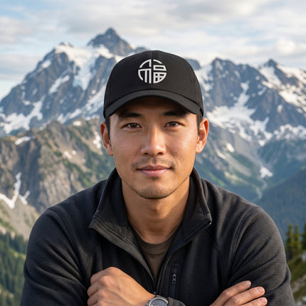 Black baseball cap featuring embroidered Fu symbol for good fortune and blessings.