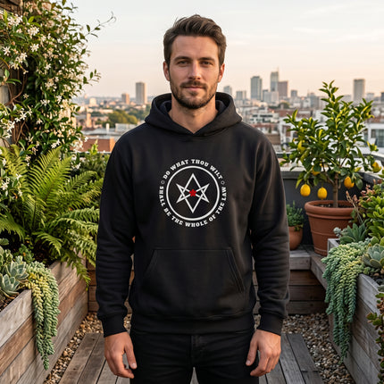 Graphic black hoodie displaying the Do What Thou Wilt hexagram symbol. Occult streetwear apparel.