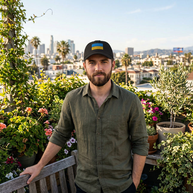 Black embroidered baseball cap featuring the Ukrainian flag design.