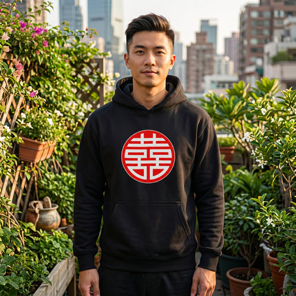 Black hoodie featuring the red Double Happiness (囍) Chinese symbol graphic. Cultural streetwear apparel.