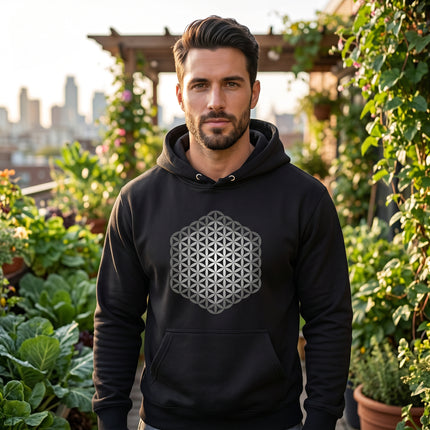 Flower of Life sacred geometry graphic on a black unisex hoodie.