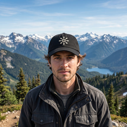Black baseball cap with embroidered Chaos Star occult symbol.