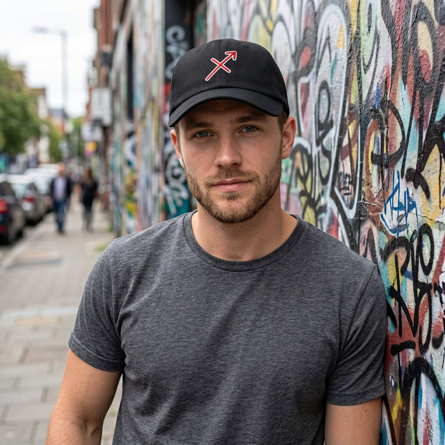 Black cap with red embroidered Sagittarius zodiac arrow symbol.