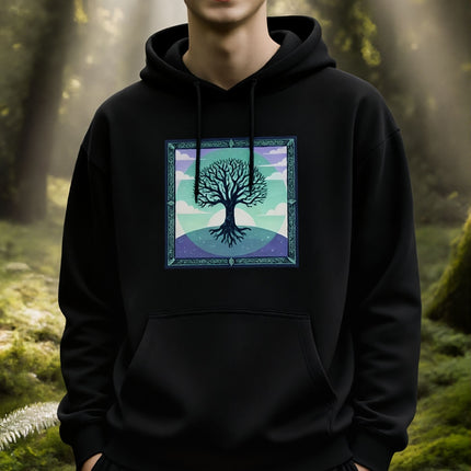 Celtic Tree of Life graphic on a black hoodie, featuring mystical nature and celestial art.
