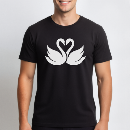 Swans forming a heart graphic on a black t-shirt, symbolizing love and romance.