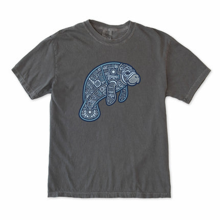 Geometric tribal manatee design printed on unisex t-shirt featuring ocean animal art.