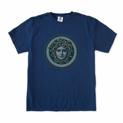 Blue t-shirt graphic featuring a mosaic depiction of the Medusa Gorgon head.