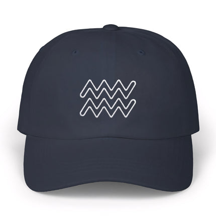 Navy baseball cap featuring white embroidered Aquarius zodiac symbol.
