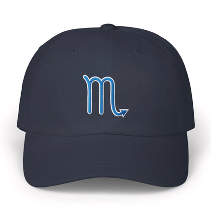 Navy baseball cap featuring embroidered Scorpio zodiac symbol.