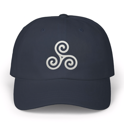Navy baseball cap with white embroidered Celtic triskelion spiral symbol.