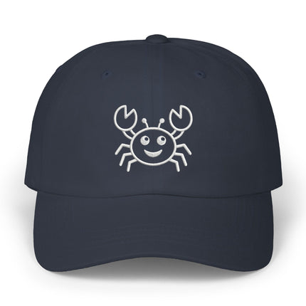 Embroidered smiling crab sea life design on a dark baseball cap.