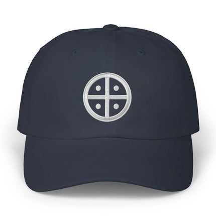Embroidered solar cross symbol on a navy baseball cap.