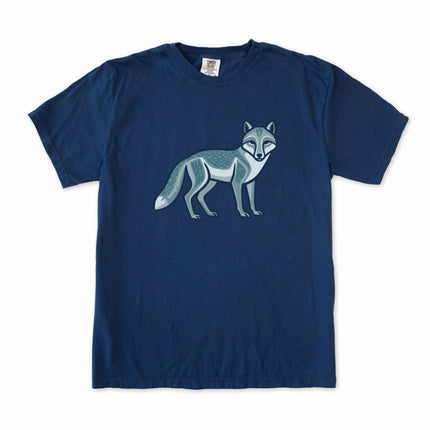 Geometric arctic fox illustration with inuit-inspired patterns printed on a graphic t-shirt.