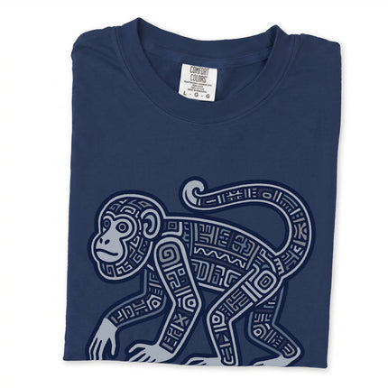 Tribal Mayan monkey design tee featuring geometric symbols and ancient artwork print.