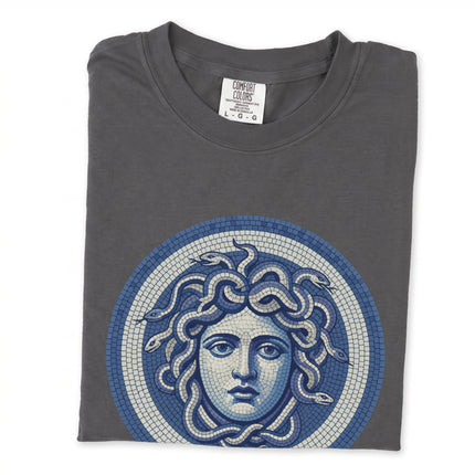 Blue t-shirt featuring a mosaic Greek mythology Medusa gorgon head graphic print.