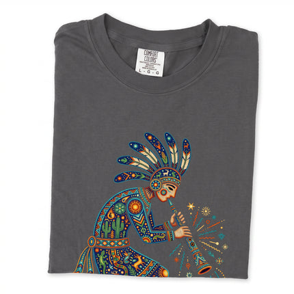 Colorful southwestern art tee featuring a graphic of a flute player in traditional attire.