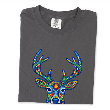Huichol deer graphic tee featuring vibrant Mexican folk art style print on a t-shirt.