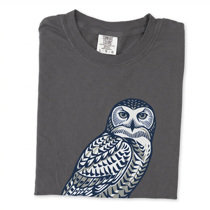 Geometric owl graphic t-shirt featuring Inuit-inspired arctic bird patterns on a unisex tee.