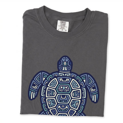 Tribal Mayan geometric green sea turtle graphic tee shirt featuring stylized patterns.