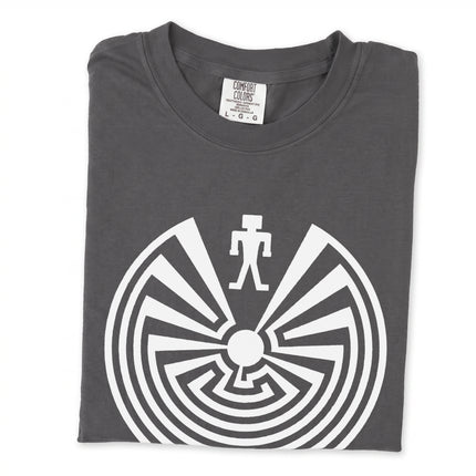 Man In The Maze t-shirt featuring the I'itoi Native American symbol design graphic.