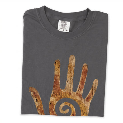 Spiral healing hand motif long sleeve t-shirt in textured earth tones.